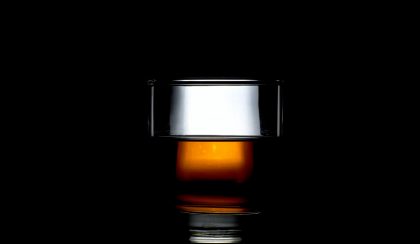 a glass of whisky centered in a dark black background what's special about Japanese whisky